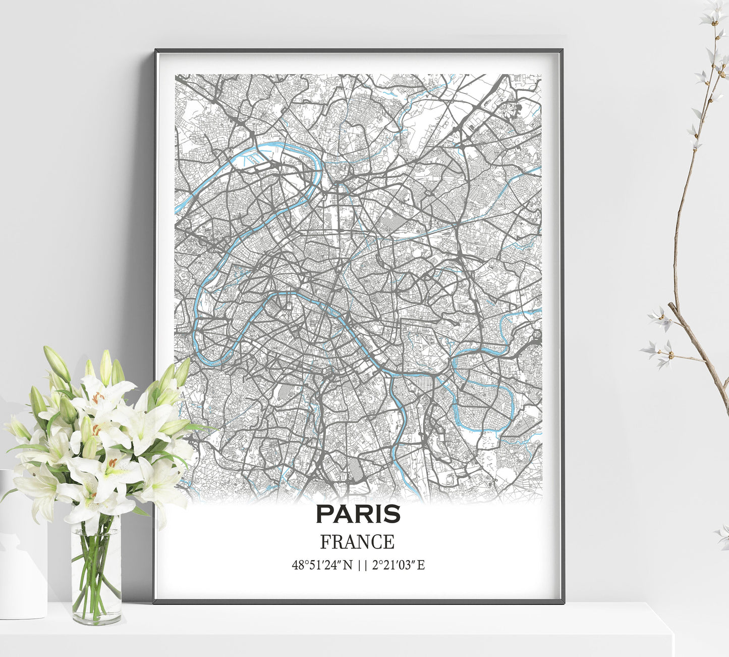 a white poster with a map of paris on it