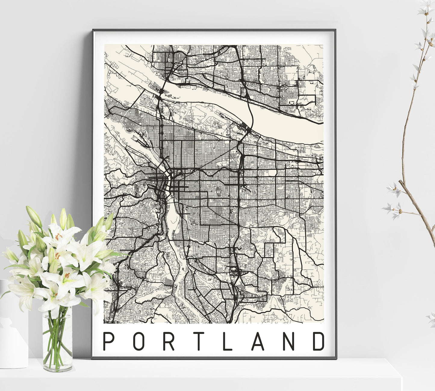 a black and white map of portland on a shelf