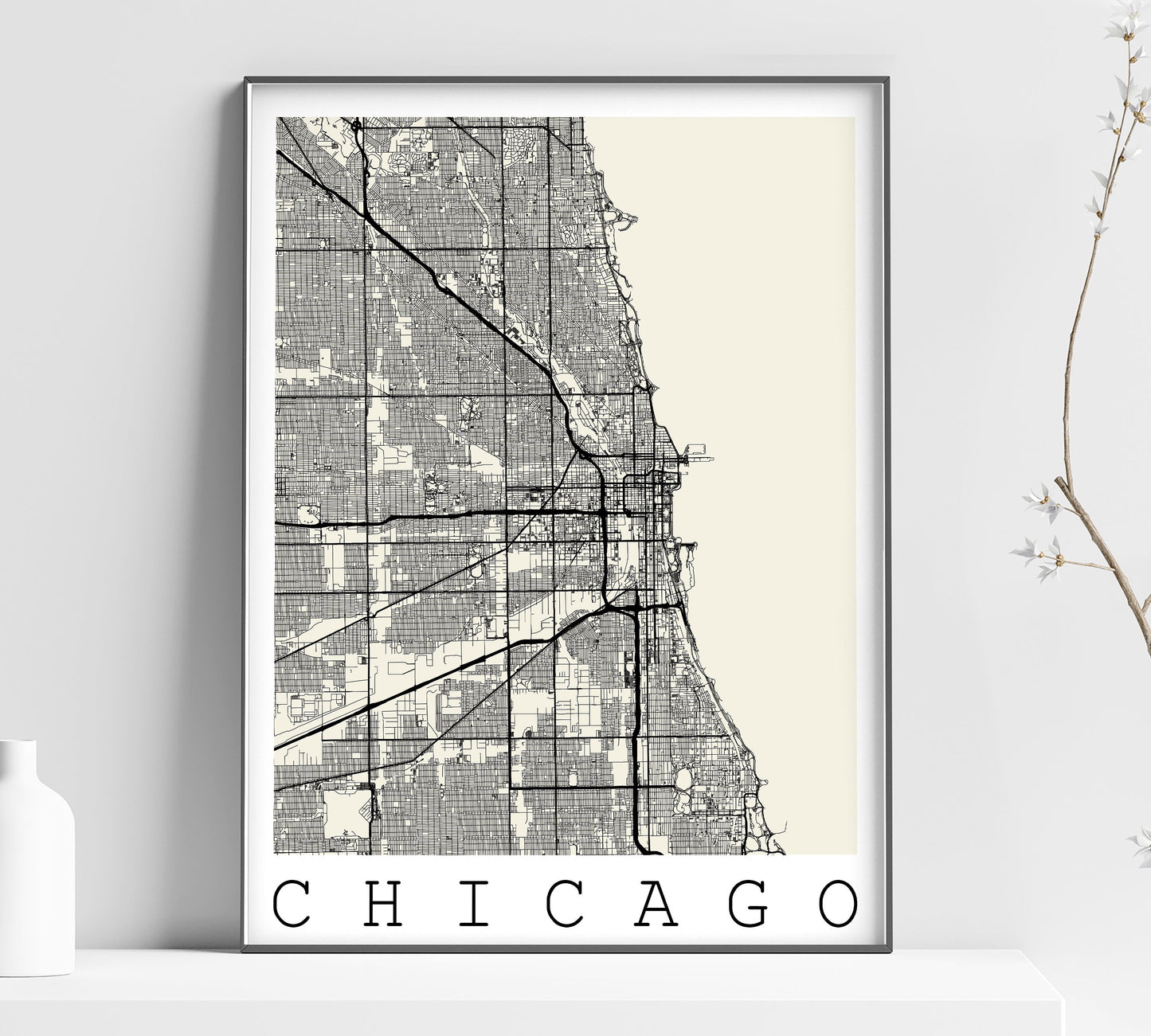 a black and white map of chicago on a shelf