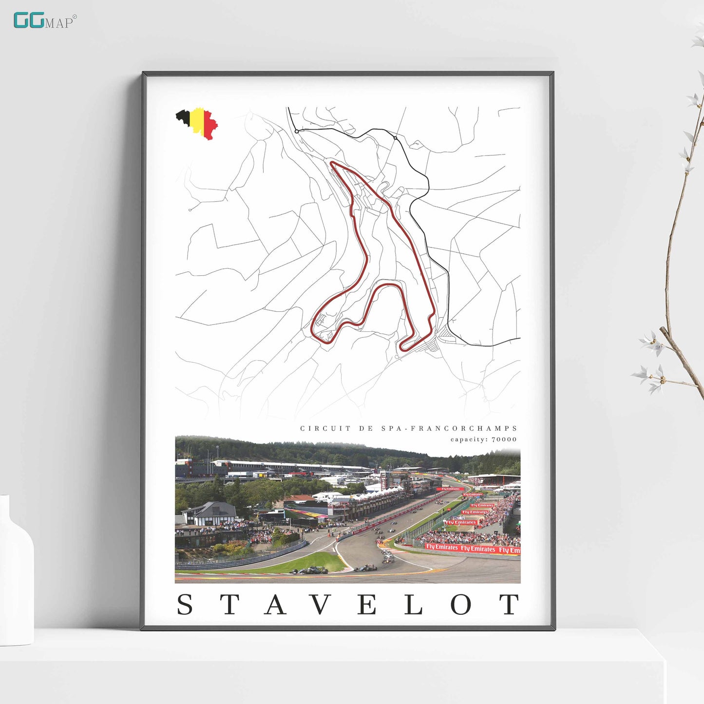 a framed poster of a race track