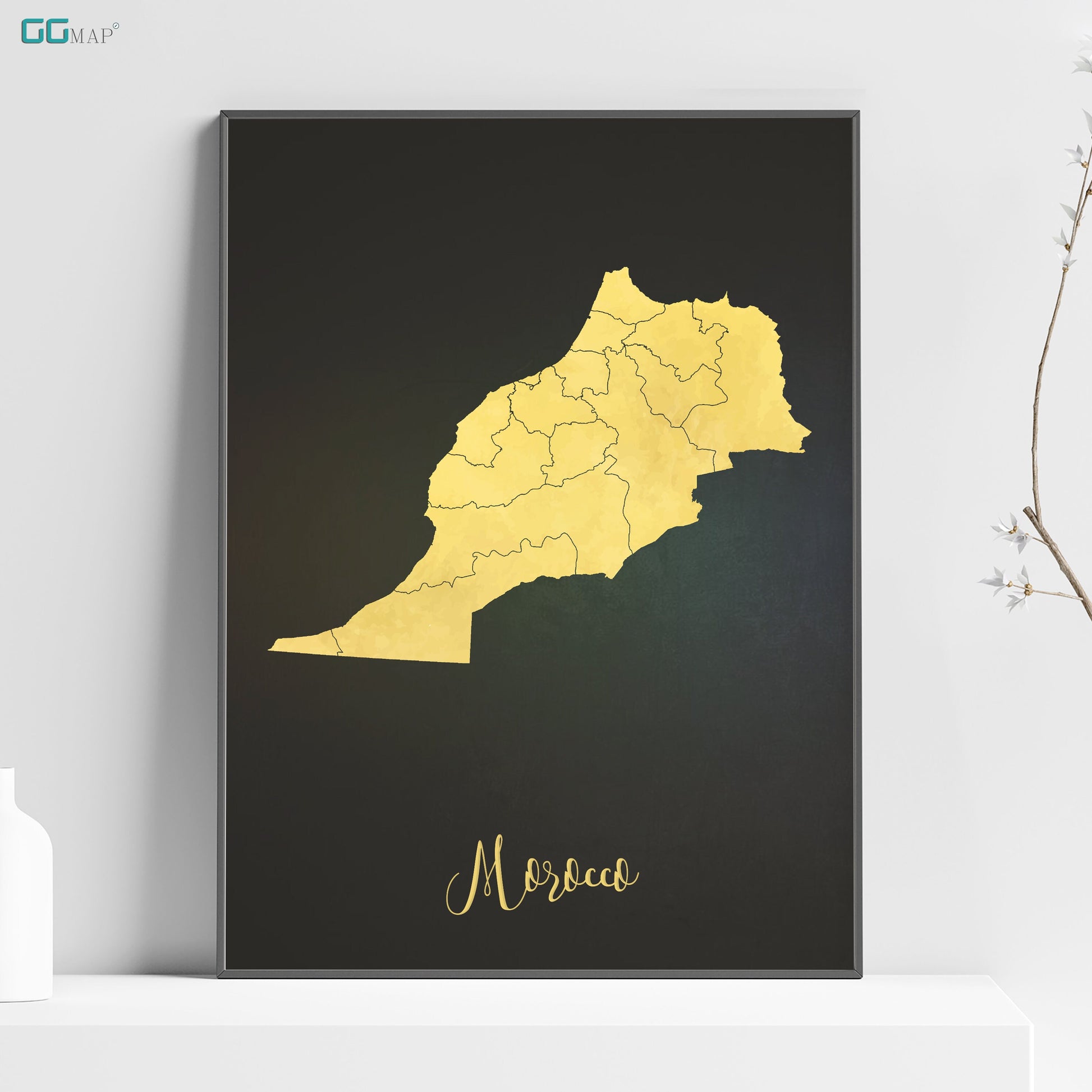 a black and gold framed map of morocco