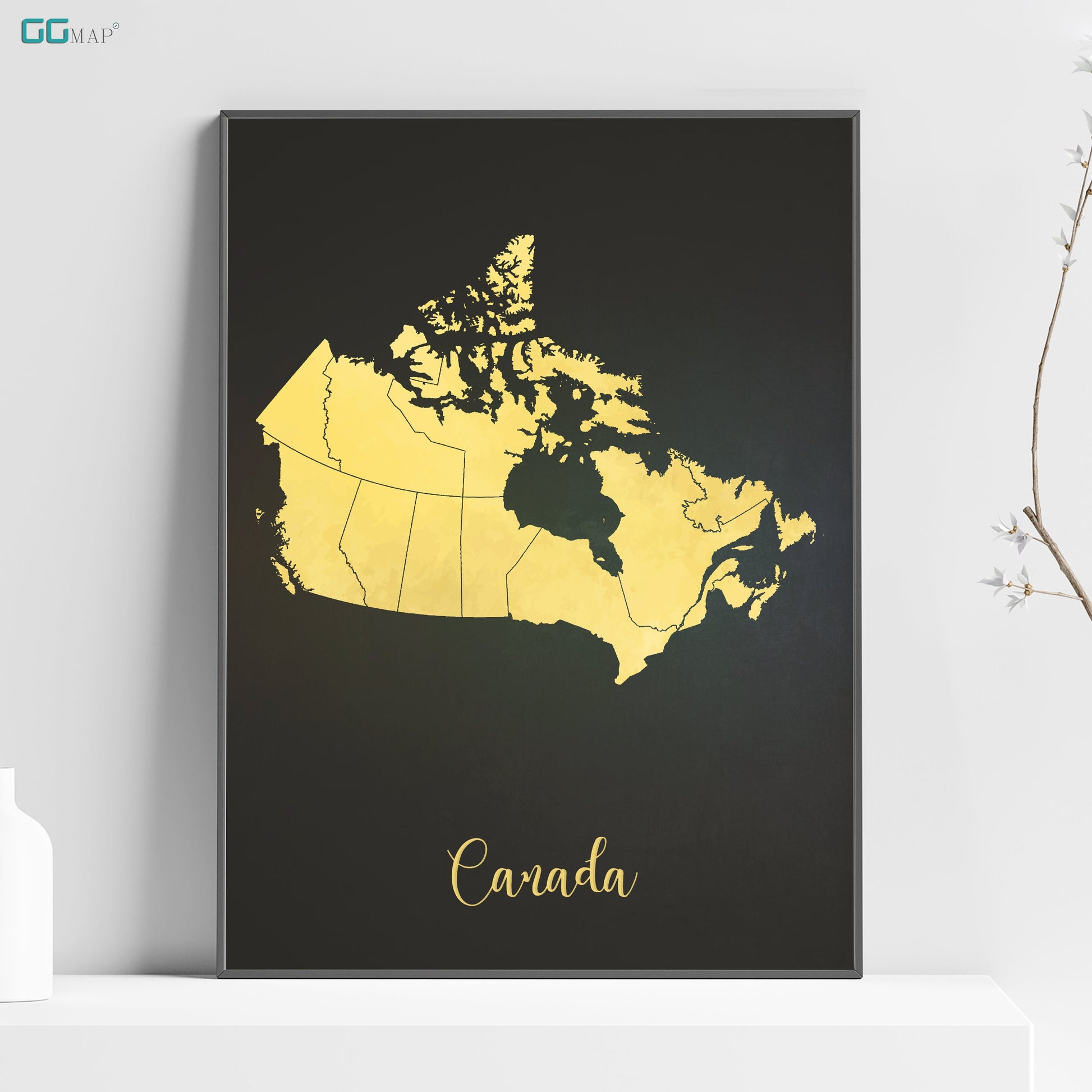 a black and gold map of canada on a shelf