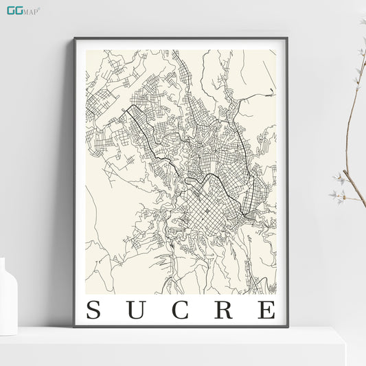 a white poster with the word sucre on it