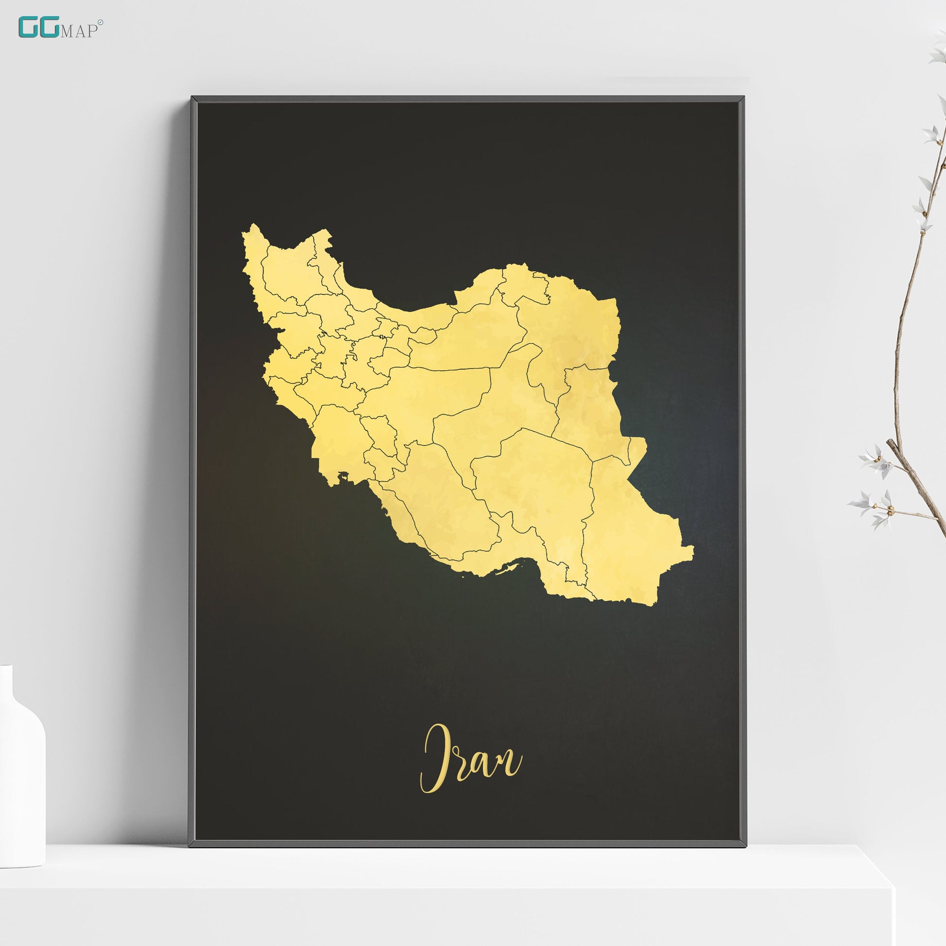 a black and gold framed map of iraq