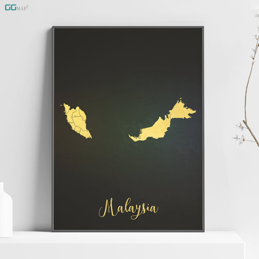 a black and gold map of malaysia on a shelf