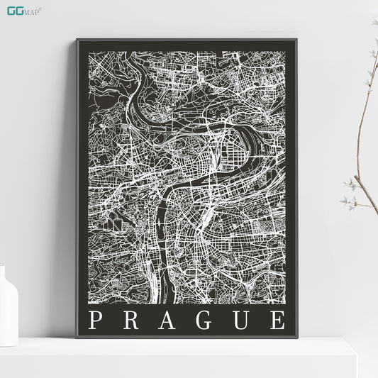 a black and white map of prague on a shelf