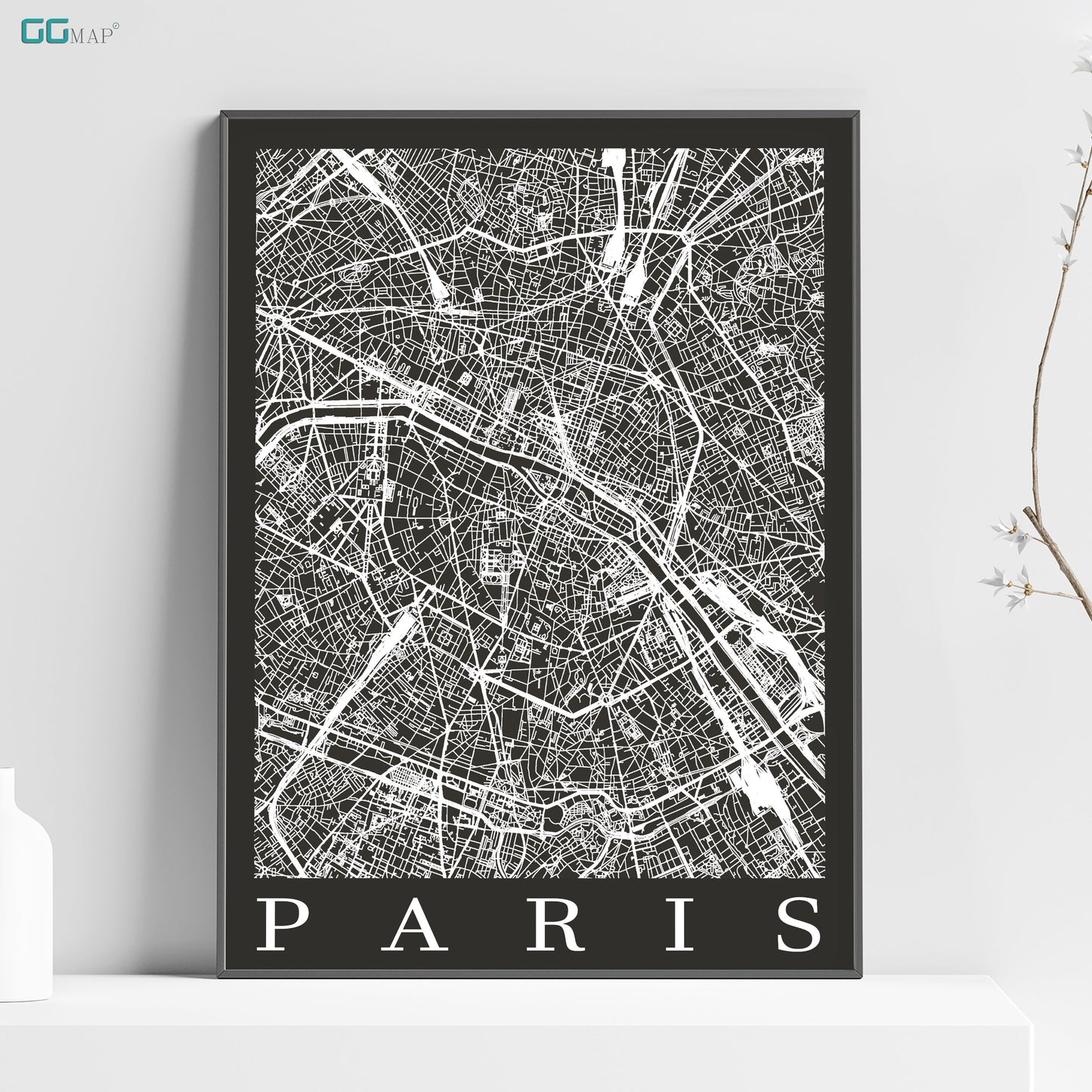 a black and white map of paris on a shelf