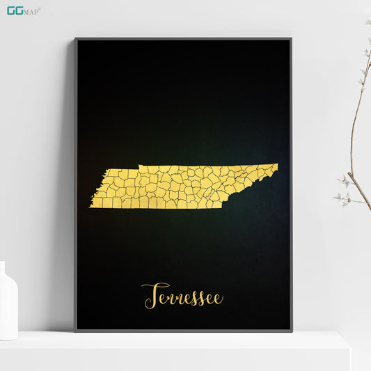 a black poster with a gold outline of the state of tennessee