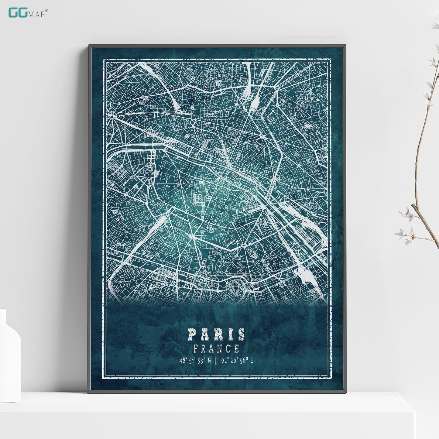 a map of paris is shown on a shelf