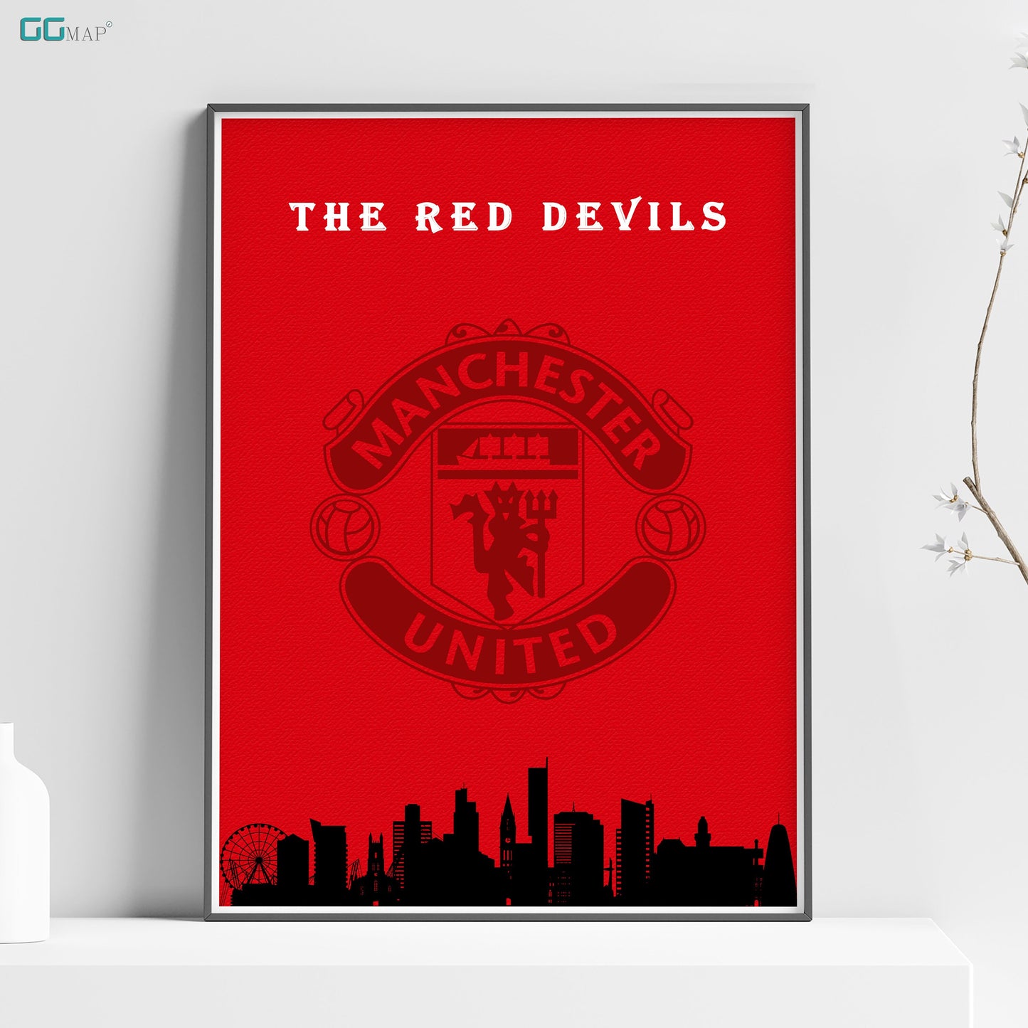 a poster of the manchester united team on a shelf