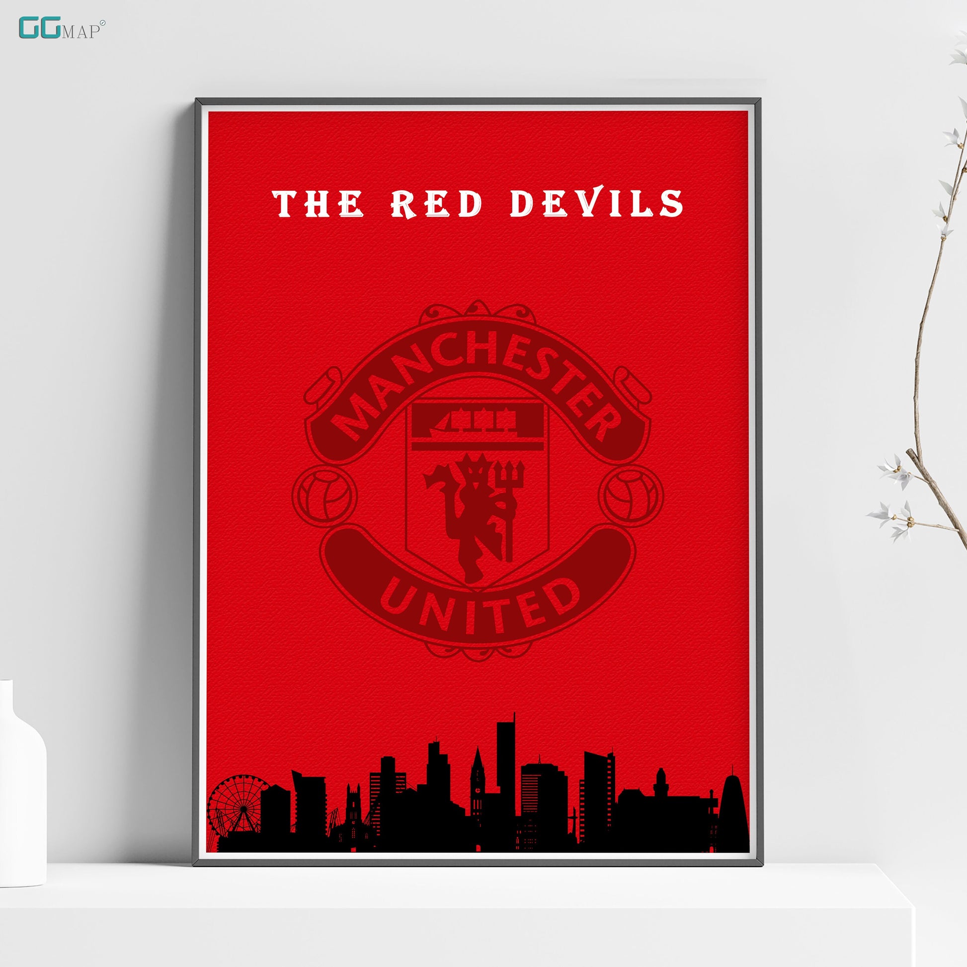 a poster of the manchester united team on a shelf