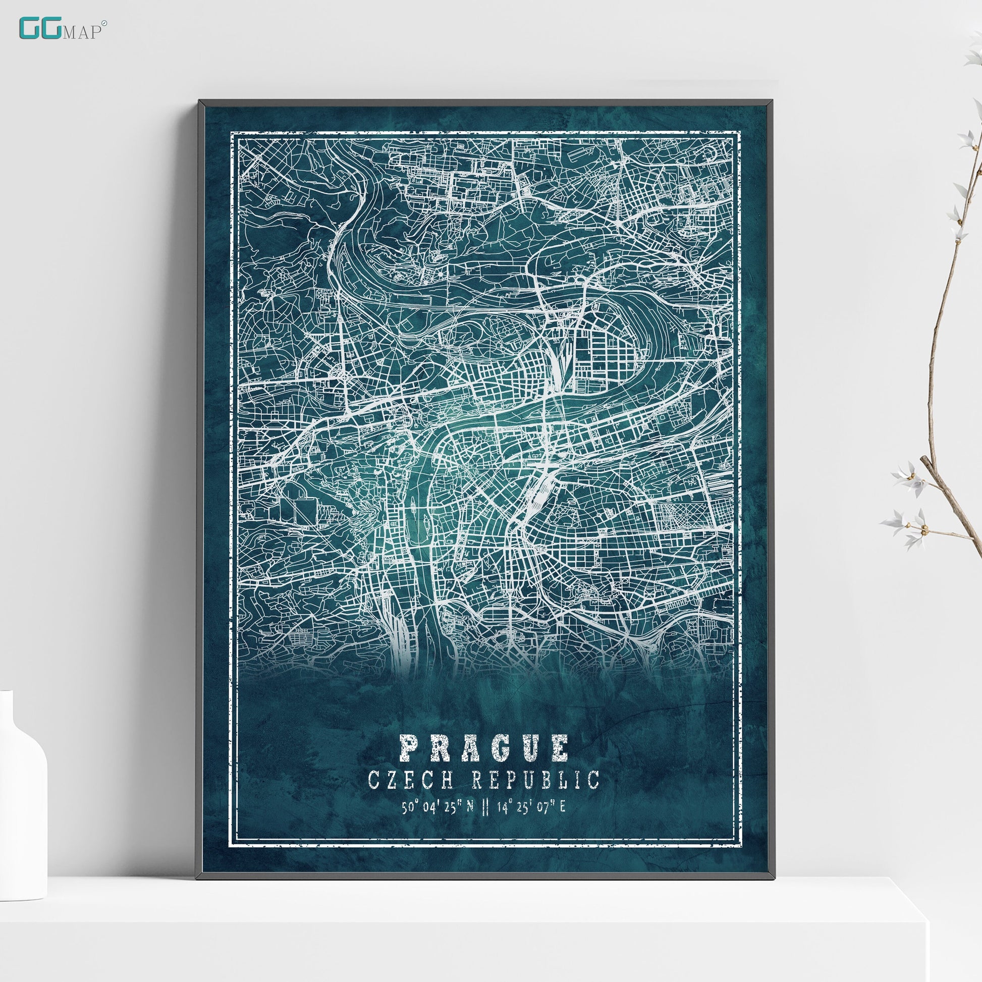 a poster of prague on a shelf next to a vase